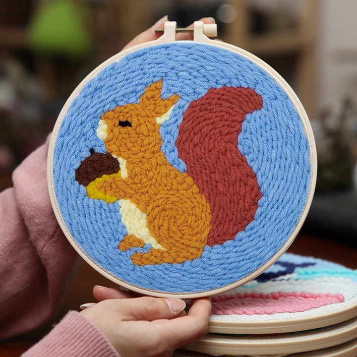 Squirrel holding a Nut Punch Needle Embroidery Kits